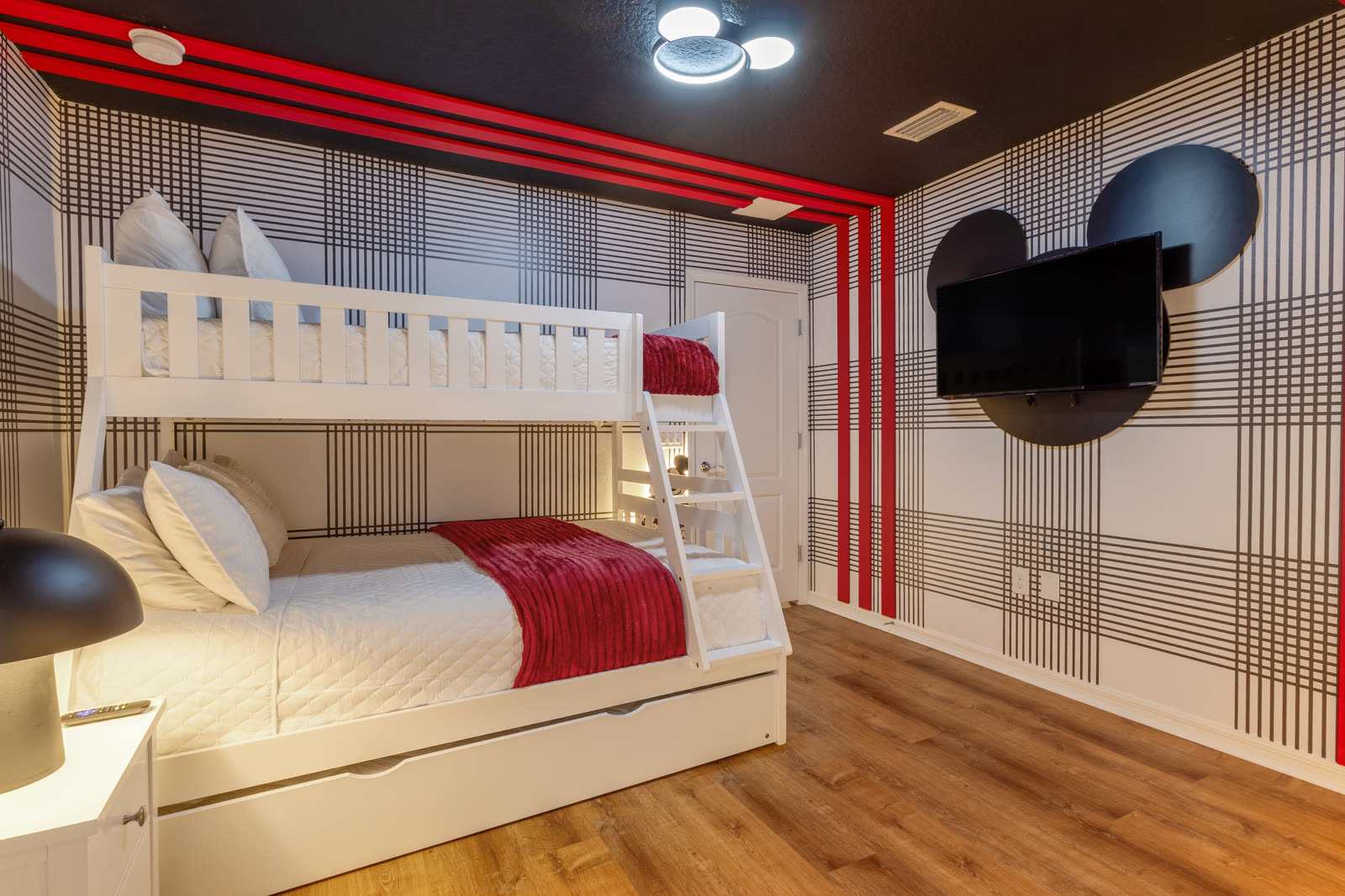 Mickey Mouse themed bunk bedroom in an Orlando vacation home interior design project