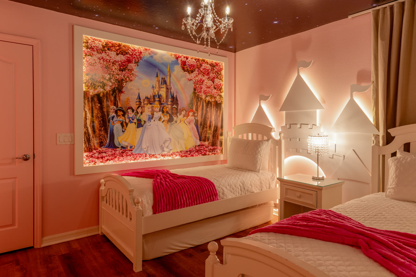 Princess themed girls bedroom with castle beds in an Orlando area vacation home